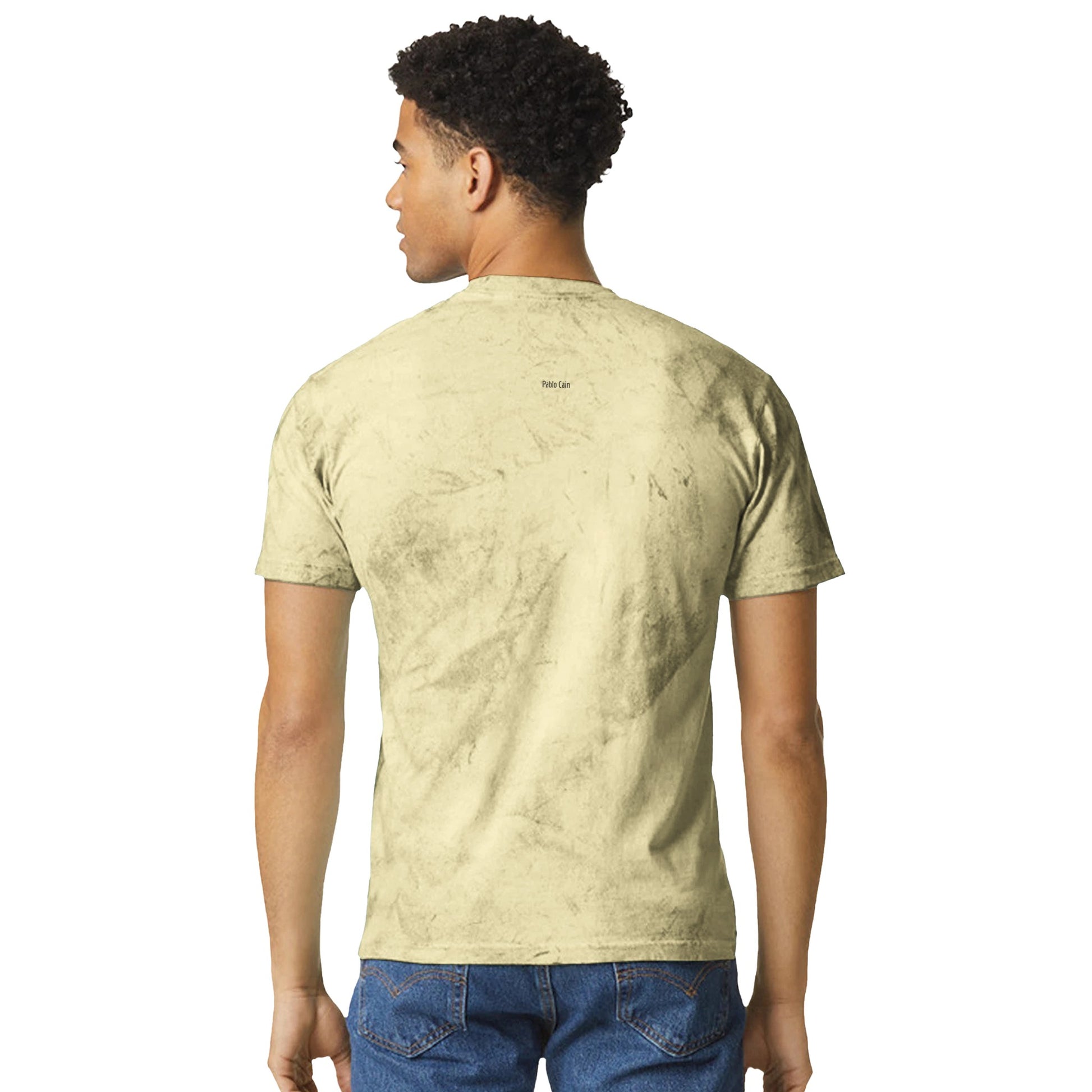 Model wearing citrine color unisex tie-dye short showing length and Pablo Cain logo on back